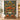 Personalized Sunflower Cow Tree of Life quilt with custom family name hung on a wall above a bench with matching pillowcases