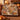 Sunflower Farm Harvest woven blanket draped over an armchair in a cozy room