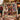 Tartan ribbon Christmas photo collage fleece blanket draped over a sofa by the fireplace