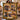 Holding a personalized Thanksgiving harvest photo blanket with custom family name