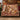 The House Keeps Christmas Christmas woven blanket draped over a sofa