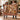 Couple holding a personalized The House Keeps Christmas Christmas woven blanket with custom family name