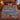 Tomte's Nordic Santa Workshop woven blanket with custom family name spread on a bed