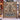 Twin Reindeer Bell Spruce woven blanket displayed outdoors on a wooden frame in the snow
