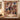 Personalized Victorian Christmas photo blanket with ten family photos displayed on a wall
