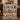Couple holding a personalized Victorian Christmas village woven blanket with custom family name woven in