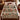 Victorian Christmas village woven blanket spread across a bed