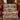 Victorian Christmas village woven blanket draped over an armchair