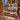 Couple holding a personalized Vintage Train Christmas photo blanket with 6 family photos and custom family name