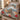 Whitetail Woodland Christmas quilt bedding set with 2 matching pillowcases on a made bed