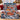 Whoville Christmas Stories fleece throw draped over a sofa