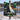 Woman holding a personalized Wicked Oz Friendship Christmas woven blanket outdoors by a snowy winter lake