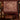 Couple holding a personalized Wild Turkey Oak Heritage Pattern woven blanket with custom family name