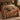 Wild Turkey Oak Savanna woven blanket spread on a bed