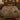 Wild Turkey Oak Tree of Life woven blanket with custom family name spread on a bed
