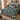Wilderkind Christmas Garden quilt bedding set with 2 matching pillowcases on a bed with Christmas decor