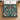Wilderkind Christmas Garden woven blanket spread on a bed