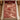 Winter Forager Trail woven blanket spread on a bed