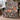 Winter Fox Hellebore woven blanket draped over an armchair