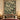 Winter nursery garden woven blanket displayed as a Christmas wall tapestry above a bed