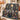 Wolf Moon Tree of Life woven blanket draped over a sofa